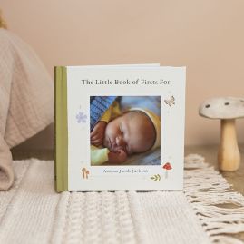 Personalised Little Book OF Firsts on cream rug with mushroom in the background