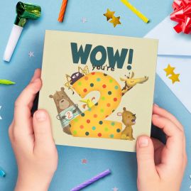 Child's hands holding book.