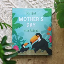 Book cover with two toucans and the title "My First Father's Day with Lucca."