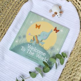 Newborn book Welcome To The World in woven cot.